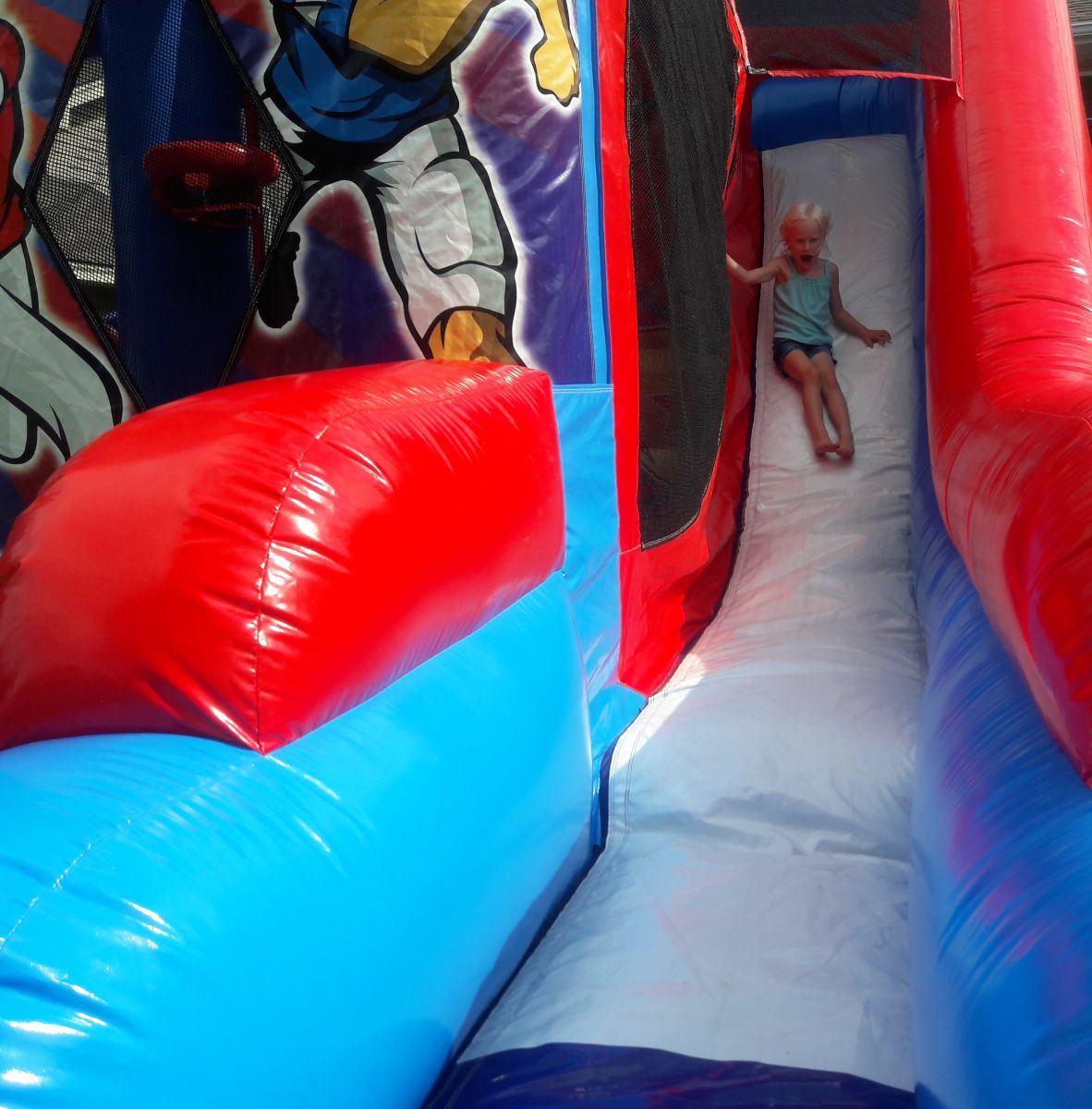 Slide from inflatable sports combo